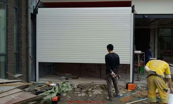 朝阳区安装卷帘门多少钱一平方维修卷帘门电机